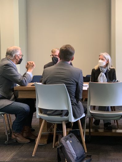 Gov Inslee and SEFS Director Brown and faculty at table