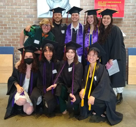 Nine SEFS students pose before graduating