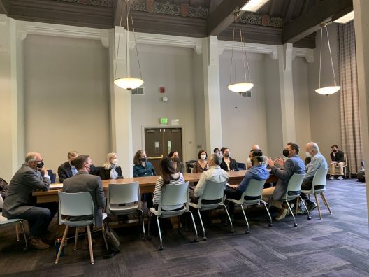 Governor Inslee sits at table with SEFS faculty and students