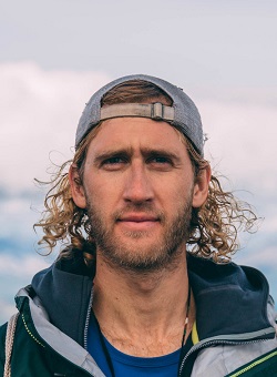 a man in a hat outdoors
